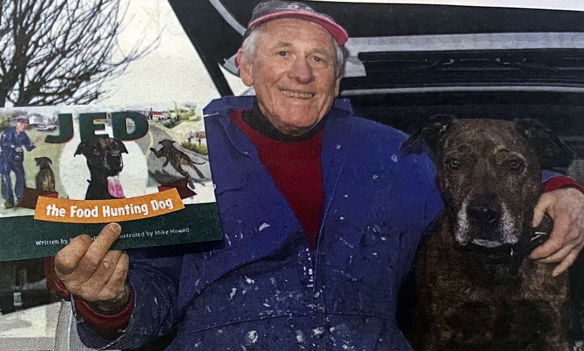 John Taylor with Jed and a copy of the book